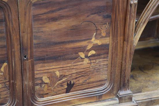 A Louis Majorelle Chicoree pattern walnut and marquetry buffet, W.7ft 4in. D.1ft 10in. H.6ft 6in.
